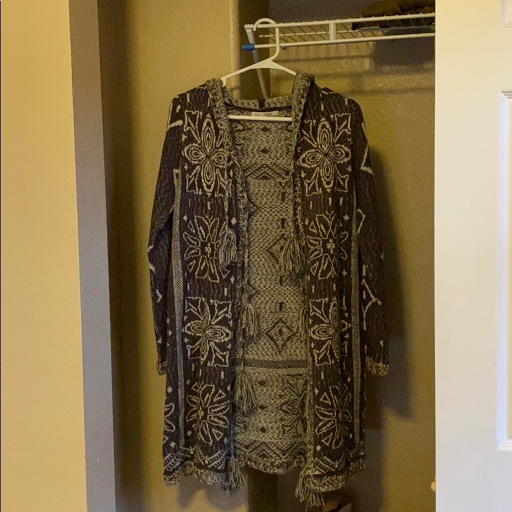 Sweater with fun designs and tassels